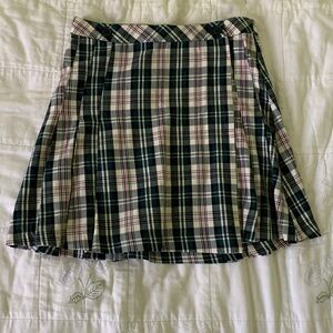 Plaid pleated mini skirt. Small, simons, buttons. Teal/black/pink/white.